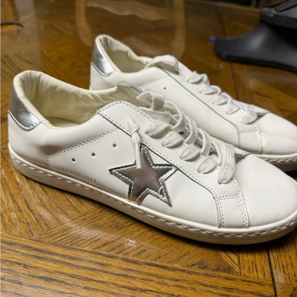 Vintage White Sneakers with Silver Star Accent